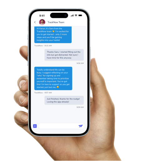 A picture of a hand holding the phone, in the phone screen you can see a text conversation interface with a chat history between an end user and an AI Assistant